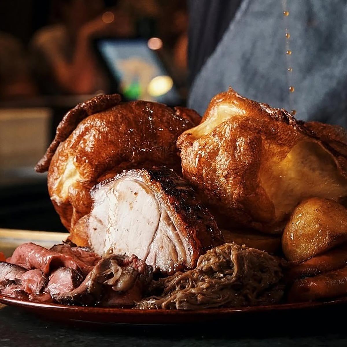 Beef-fat roast potatoes and trimmings at temper